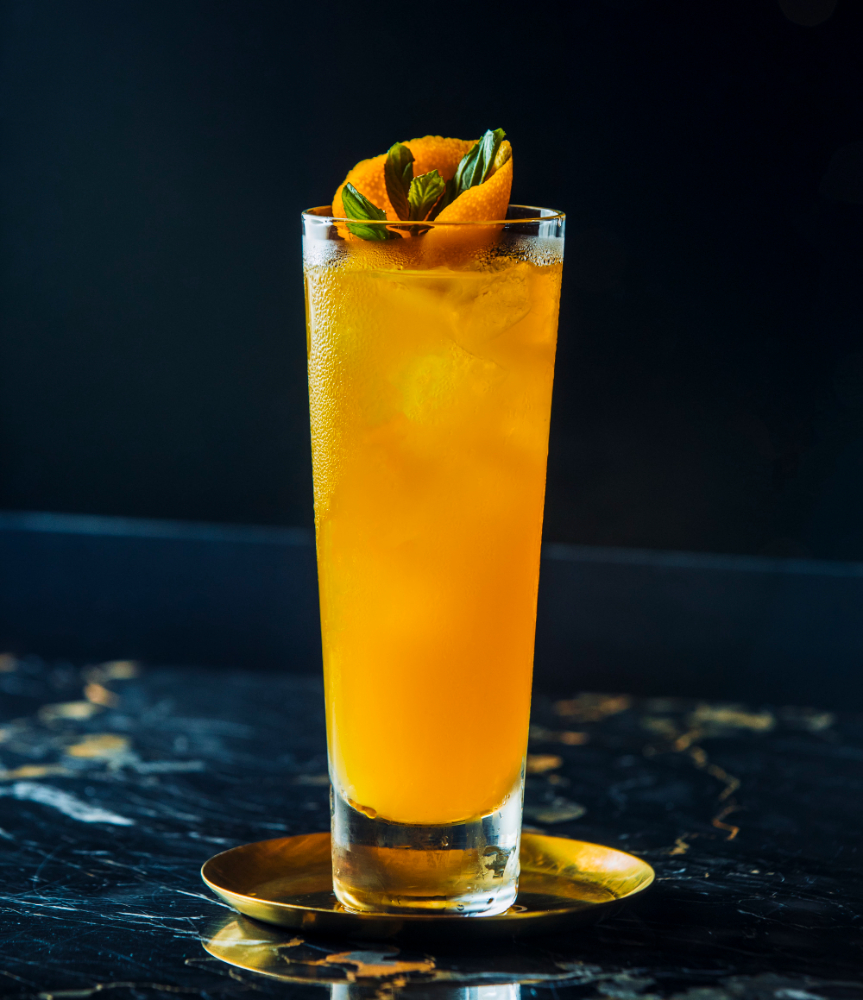 MANGO ICED TEA SPRITZER - orange cocktail with ice table 1